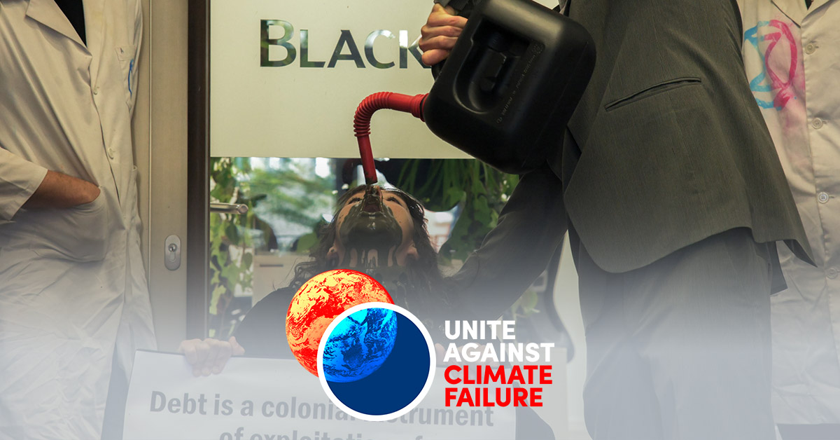 Scientist Rebellion und Debt for Climate blockieren BlackRock, um deren Rolle in der Ausweitung der fossilen Brennstoffförderung und Verschuldung des Globalen Südens aufzuzeigen.