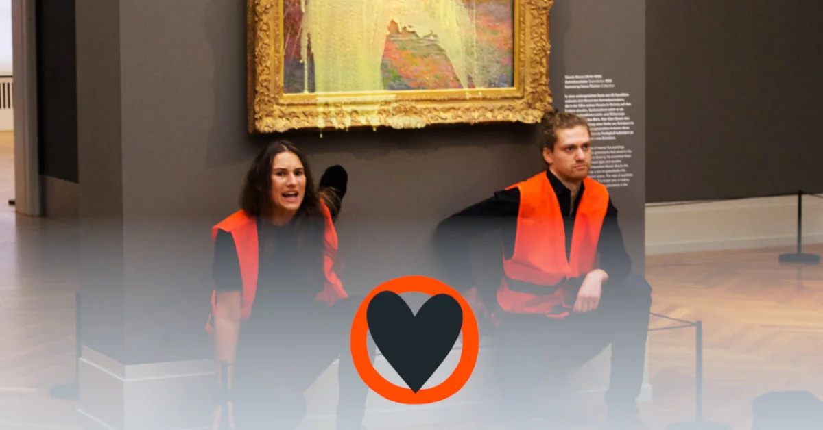 Two people in high-visibility vests stick under the painting “Les Meules” by Monet. The painting has been covered with mashed potatoes.