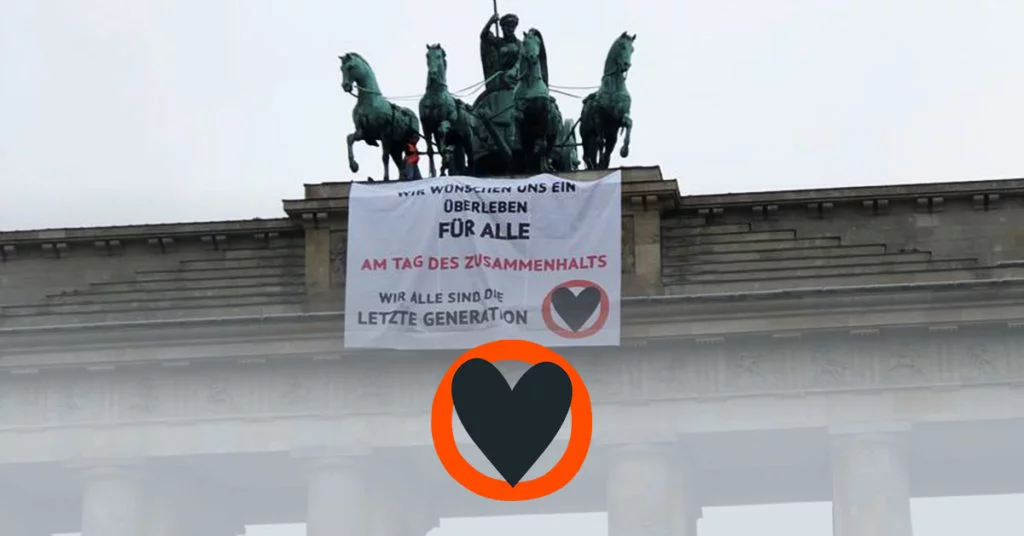Brandenburger Tor bestiegen – Am Tag des Mauerfalls ruft die Letzte Generation zum Zusammenhalt auf